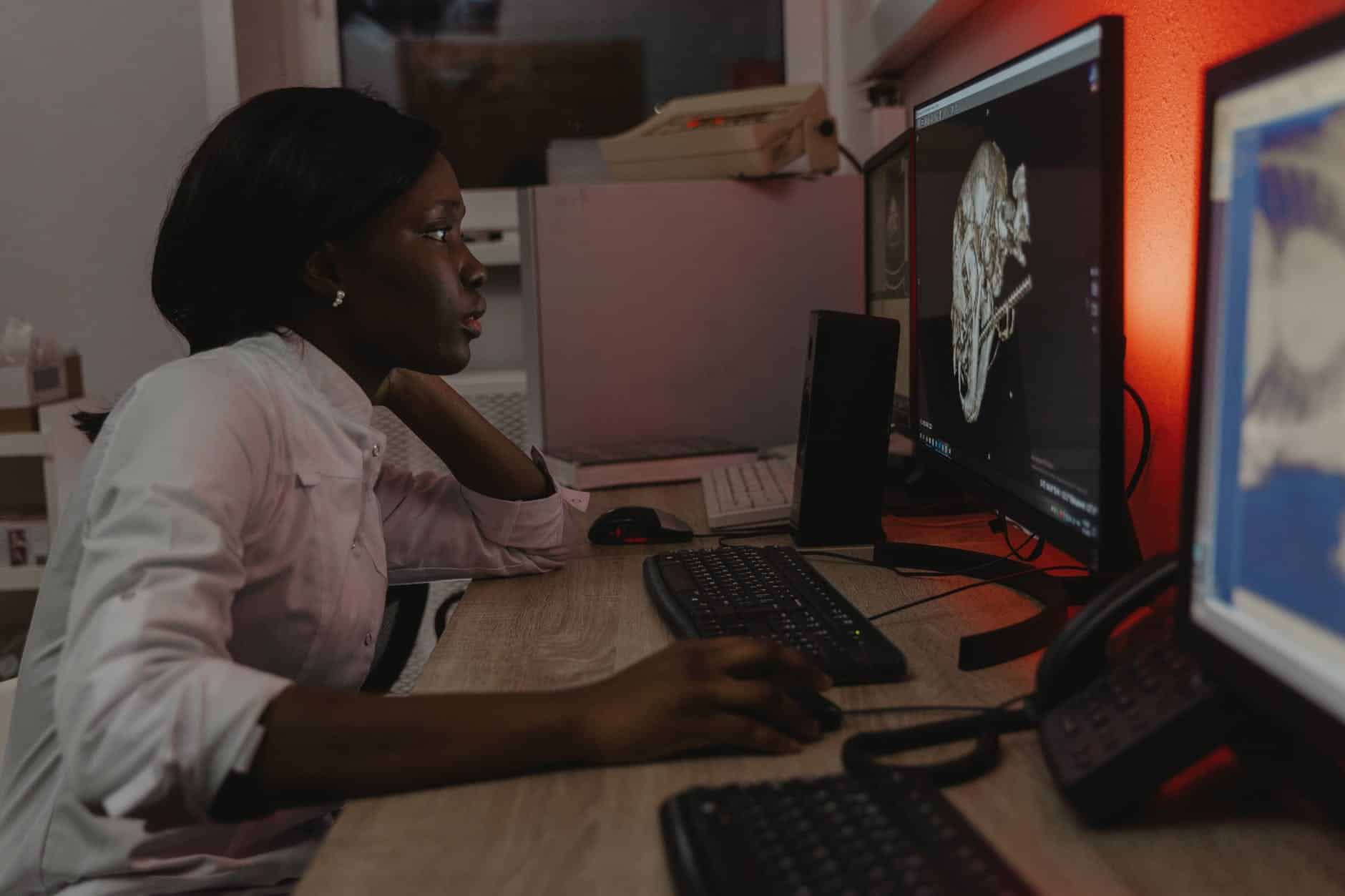 Hypocalcemia in Dogs: Causes, Symptoms, and Treatment 7 woman in white long sleeve shirt sitting beside wooden table using computer